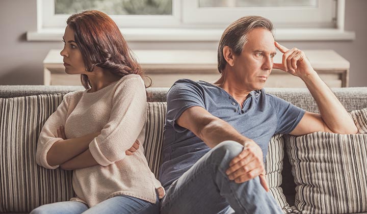 husband-and-wife-not-looking-at-each-other-720×420